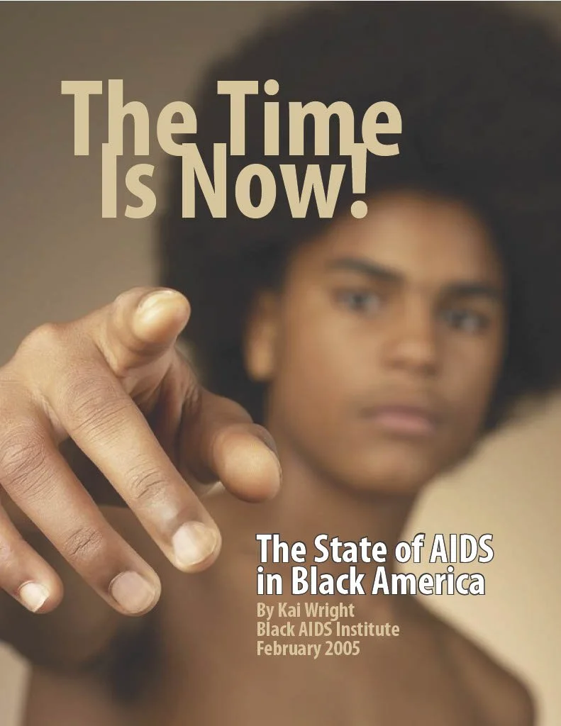 Man in a big afro blurred in the background with focus being on a hand stretched out pointing at the reader