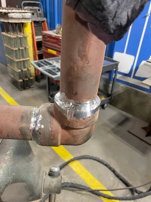 Hydraulic pipe fitting was leaking around the fitting.