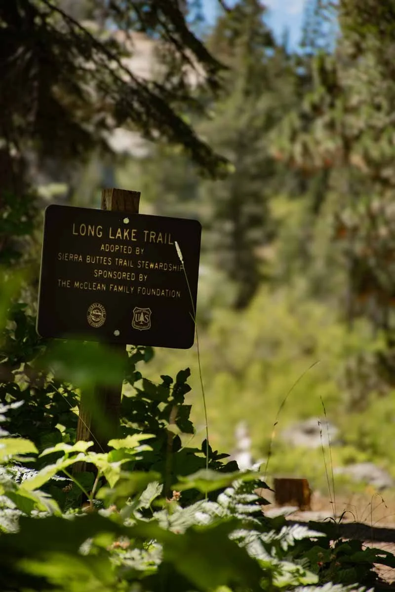 Adopt a trail sign on trail in Lakes Basin