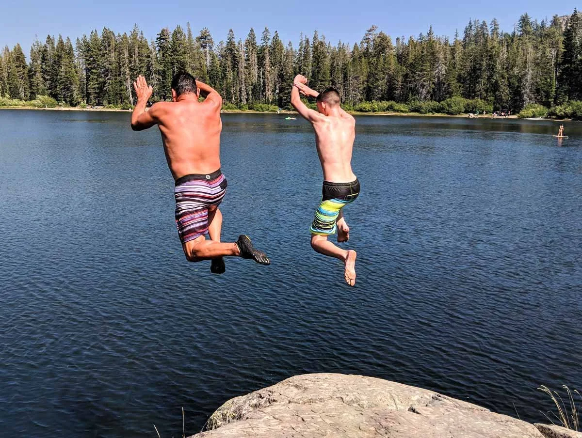 Jumping into an alpine lake