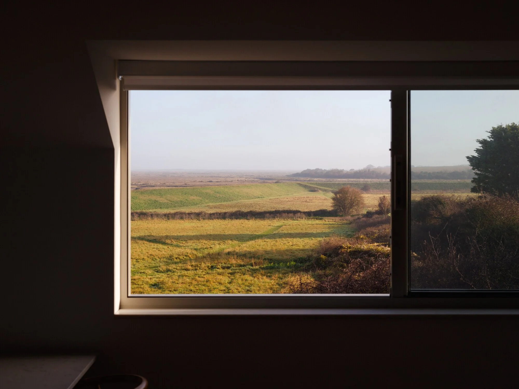 View out of a luxury property in Wells-next-the-Sea, looking out to vast fields