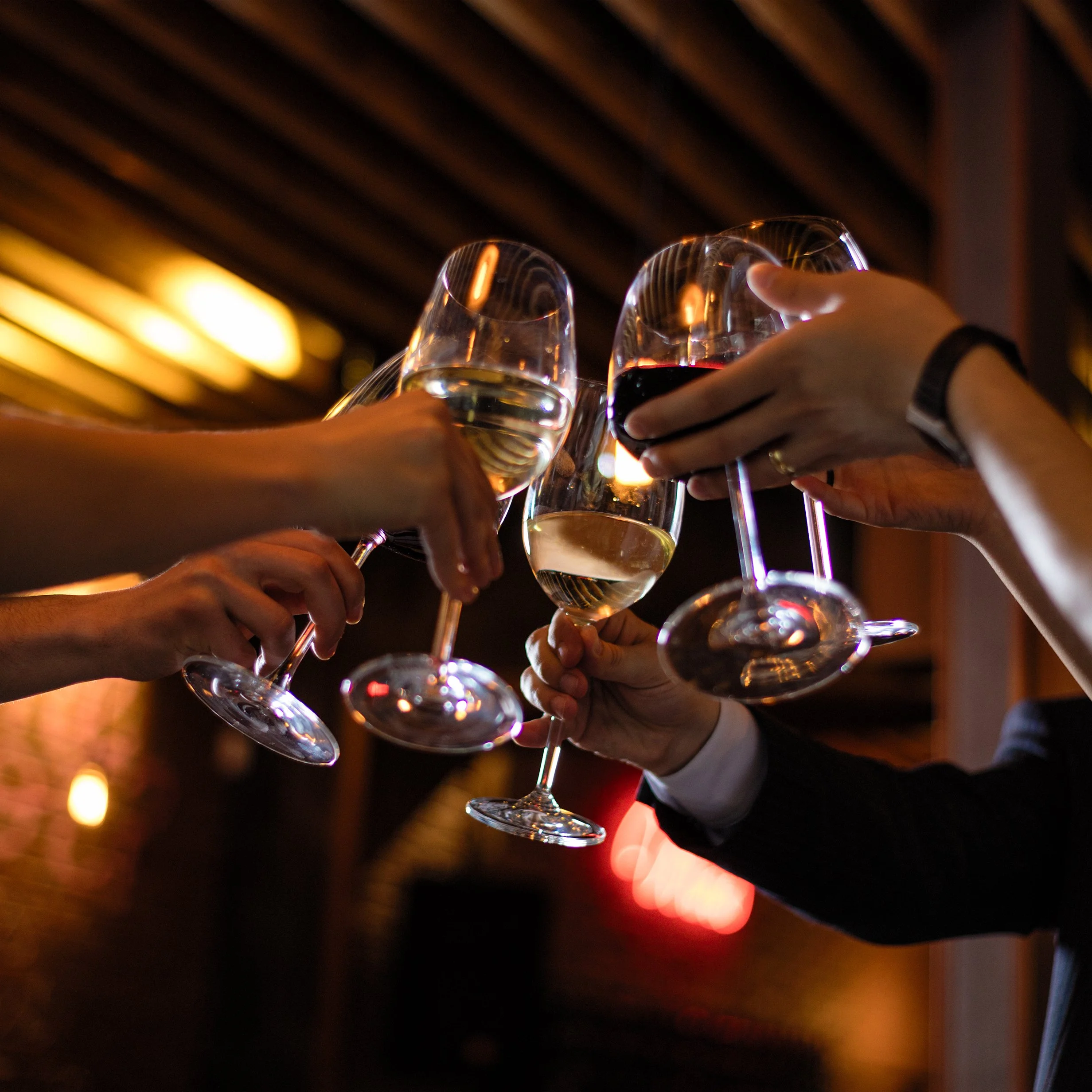 vecteezy_people-clinking-wine-glasses_1433680.jpg