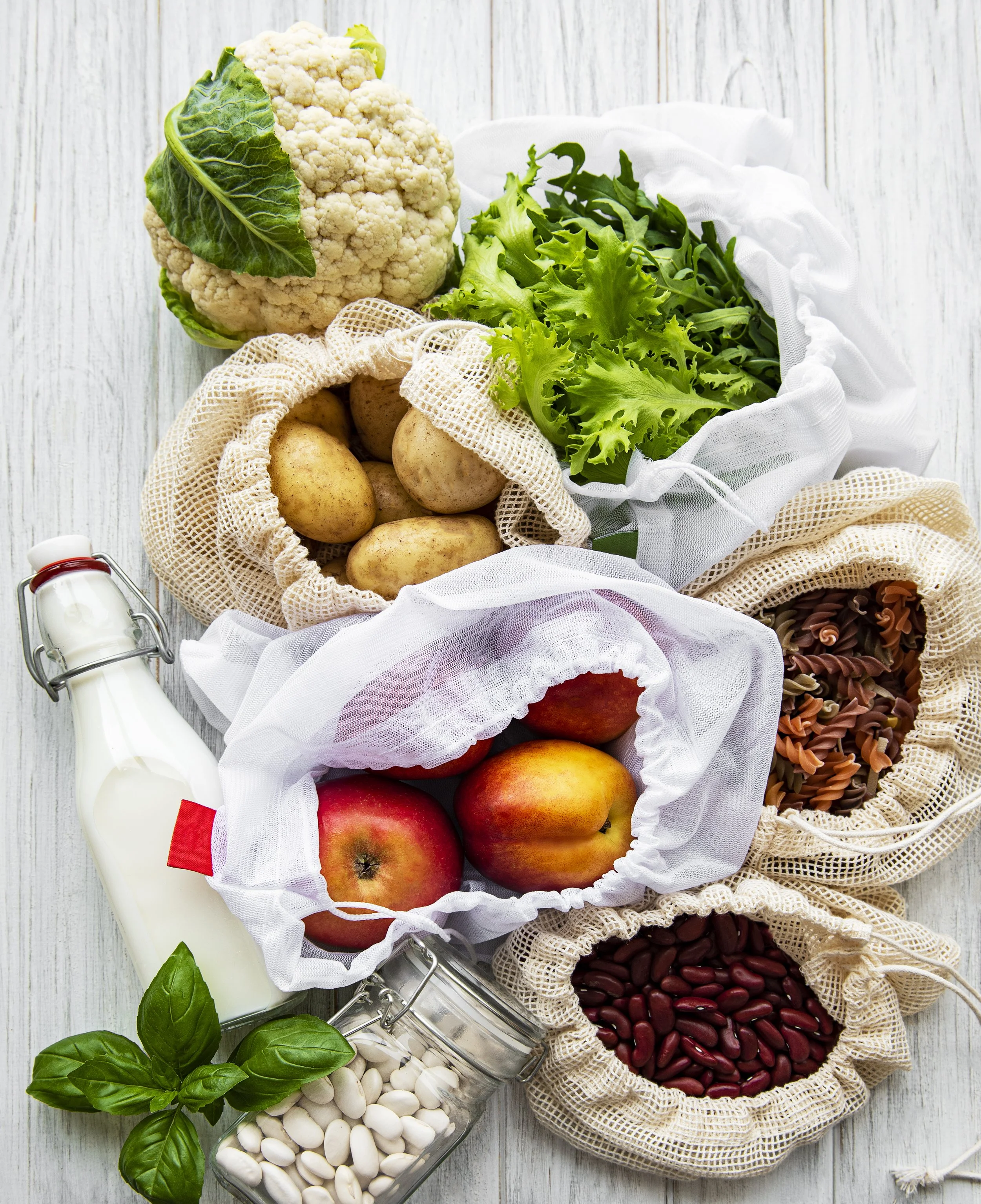 vecteezy_fresh-fruits-and-vegetables-in-eco-cotton-bags-on-table-in_2150614.jpg