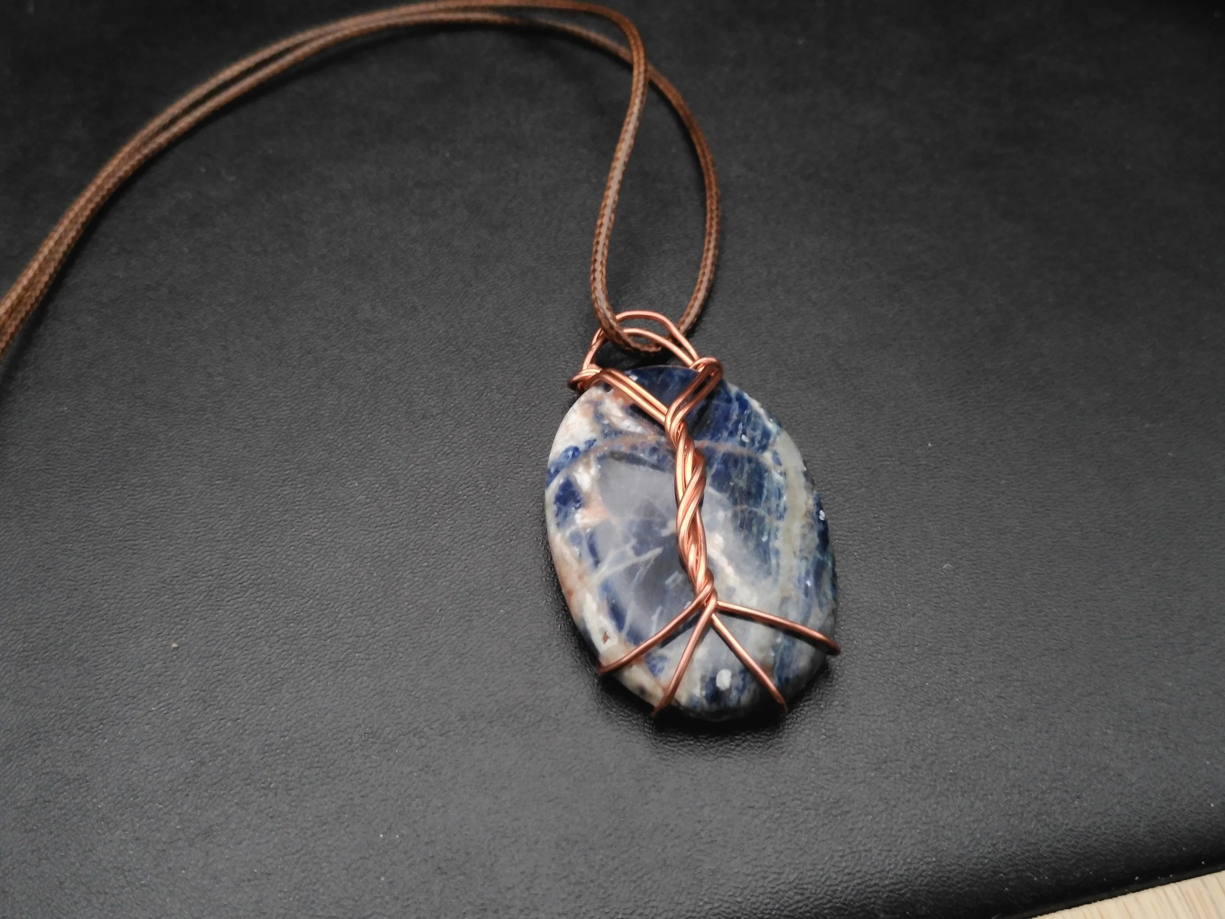 Russian Sodalite wrapped in Copper