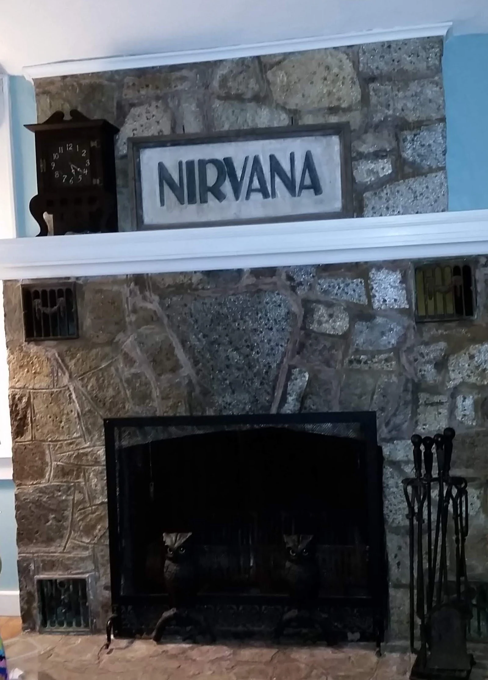 Bolton Notch Stone Fireplace, Original Avery farmhouse clock from 1810 South Street, Original Nirvana sign from 74 Avery Shores
