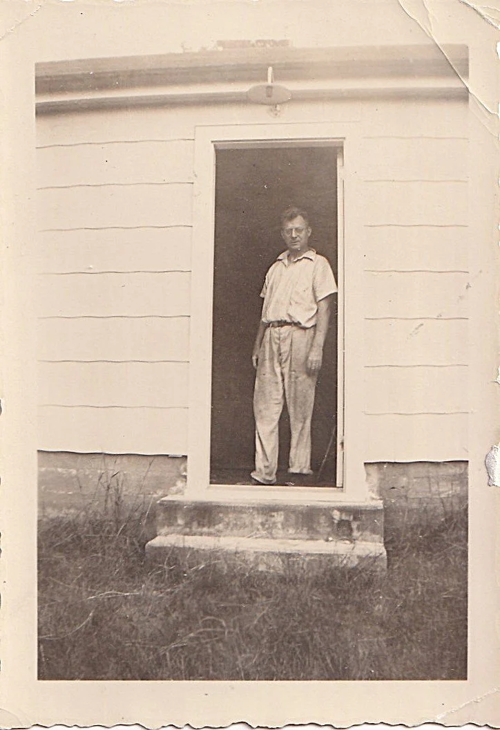 Charles Mellor, puttering in his garage at 65 Avery Shores