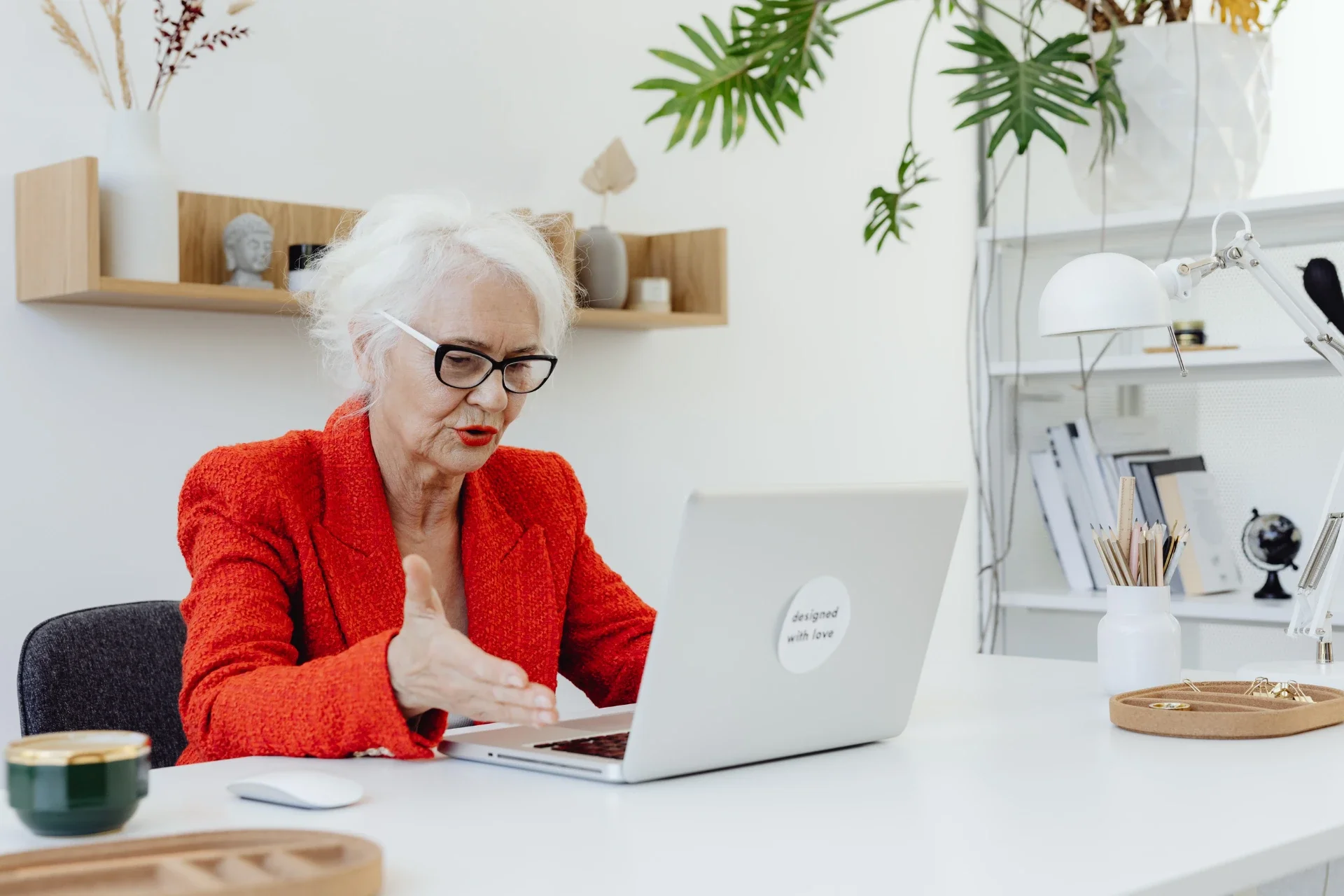 A CEO on a conference call with her financial advisor