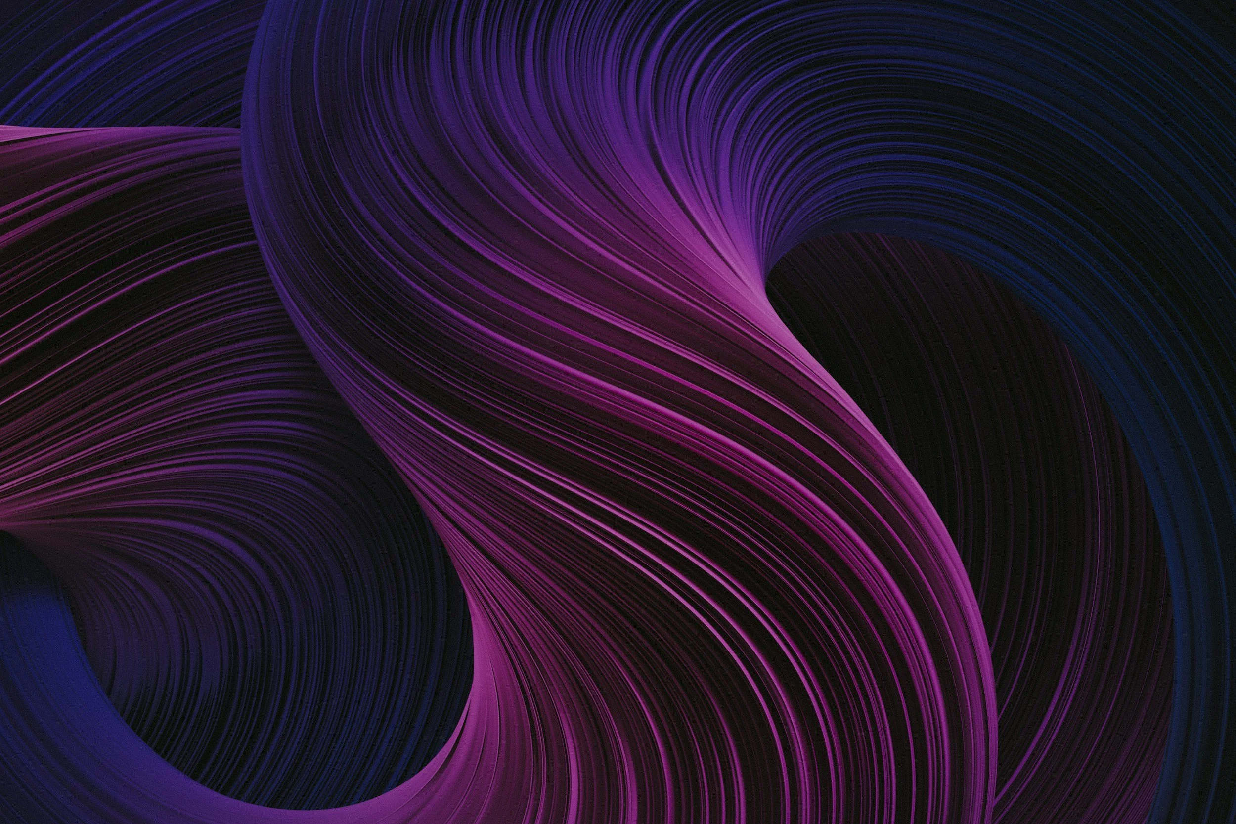 Abstract swirl of fine magenta and deep blue strands on a dark background