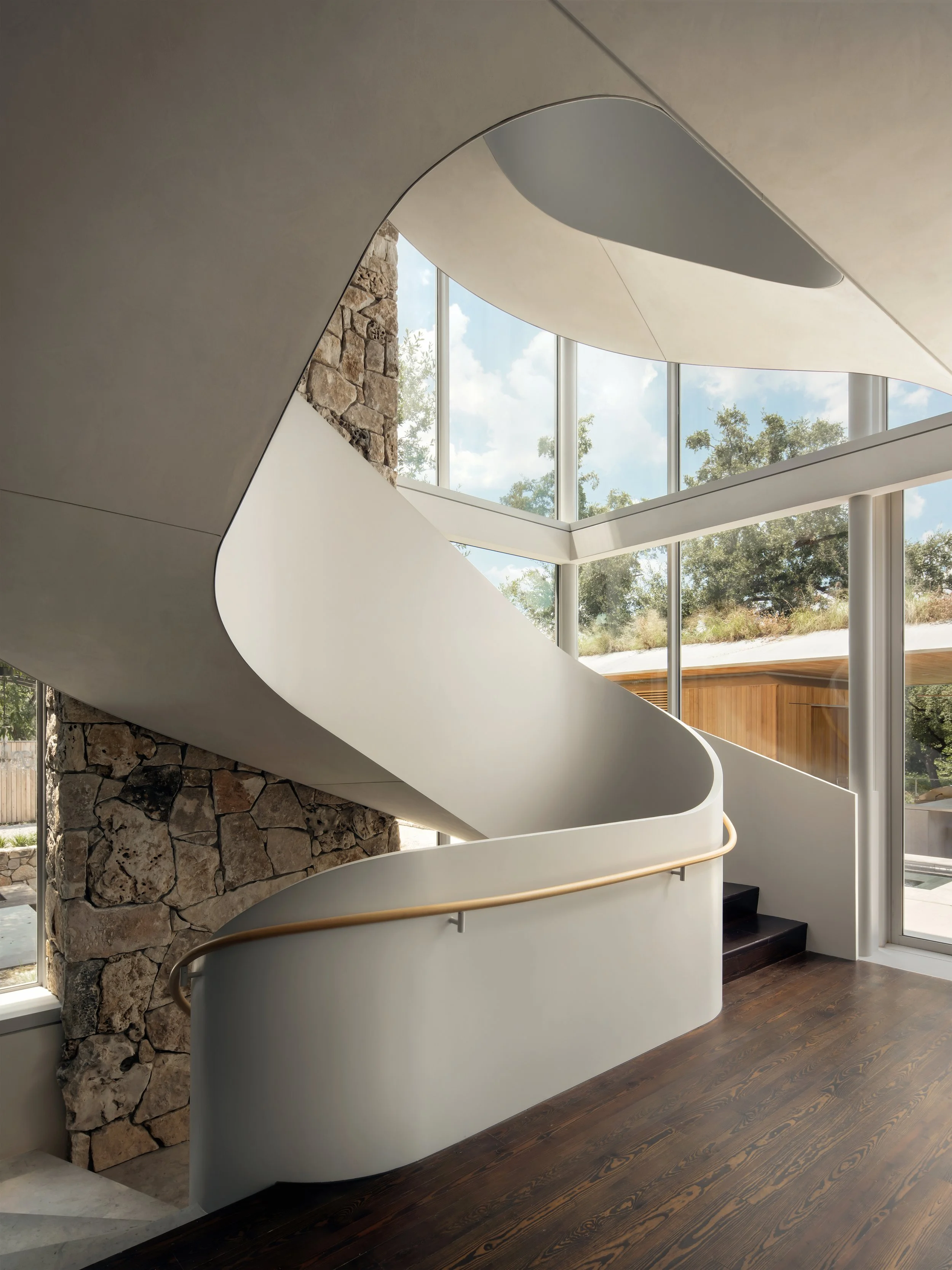 Travis Heights Historic Home
2021
_
"Connected by a grand spiral staircase, the
progression of the four levels of the home
feature playful patterns and hidden nooks,
illuminating a unique living experience of
merging past and present." —Architizer
_