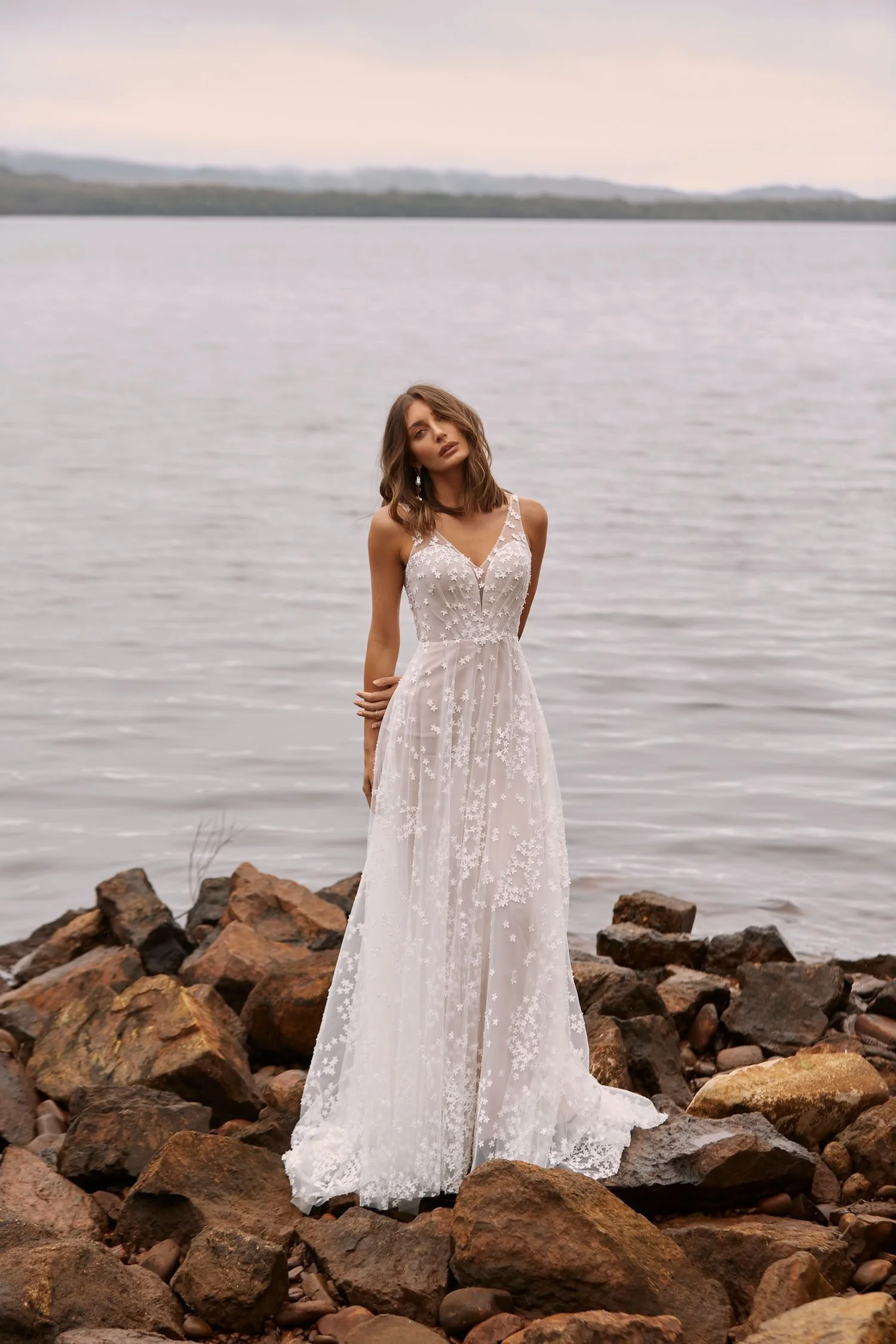 CYRA-ML20099-FULL-LENGTH-TULLE-A-LINE-GOWN-WITH-3D-EMBROIDERED-LACE-V-NECKLINE-ILLUSION-STRAPS-V-BACK-ZIPPER-CLOSURE-WEDDING-DRESS-MADI-LANE-BRIDAL-1.jpg