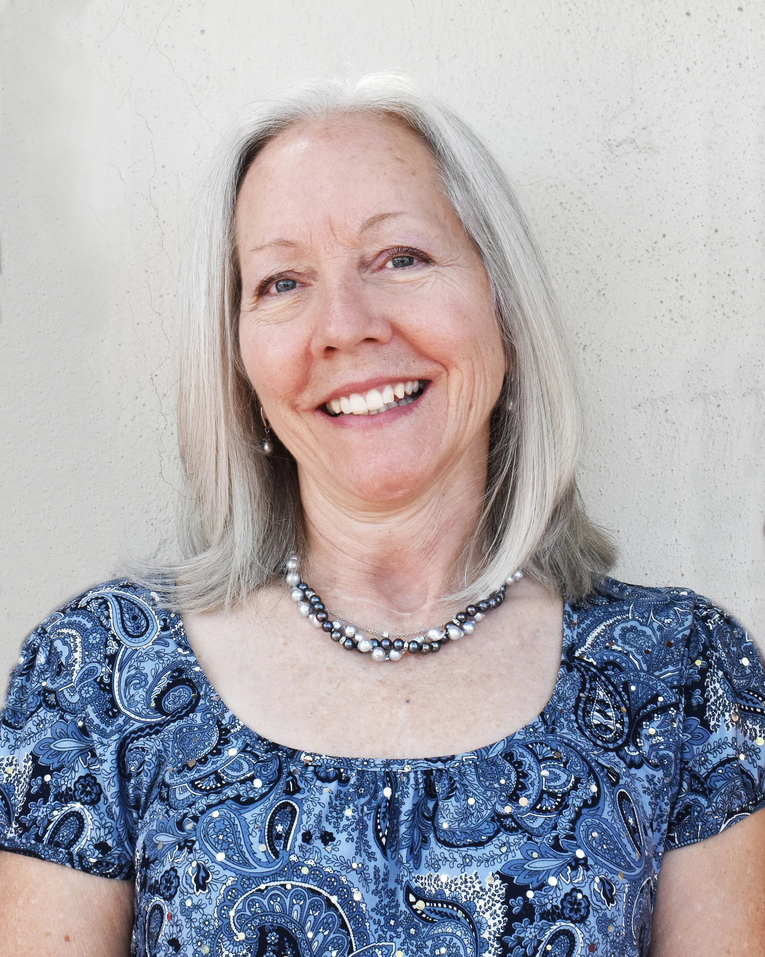 Liz Newnham, the Designs In Gold in house photographer and social media manager. Formerly an elementary school teacher, Liz is a brilliant photography artist and essential part of our team.