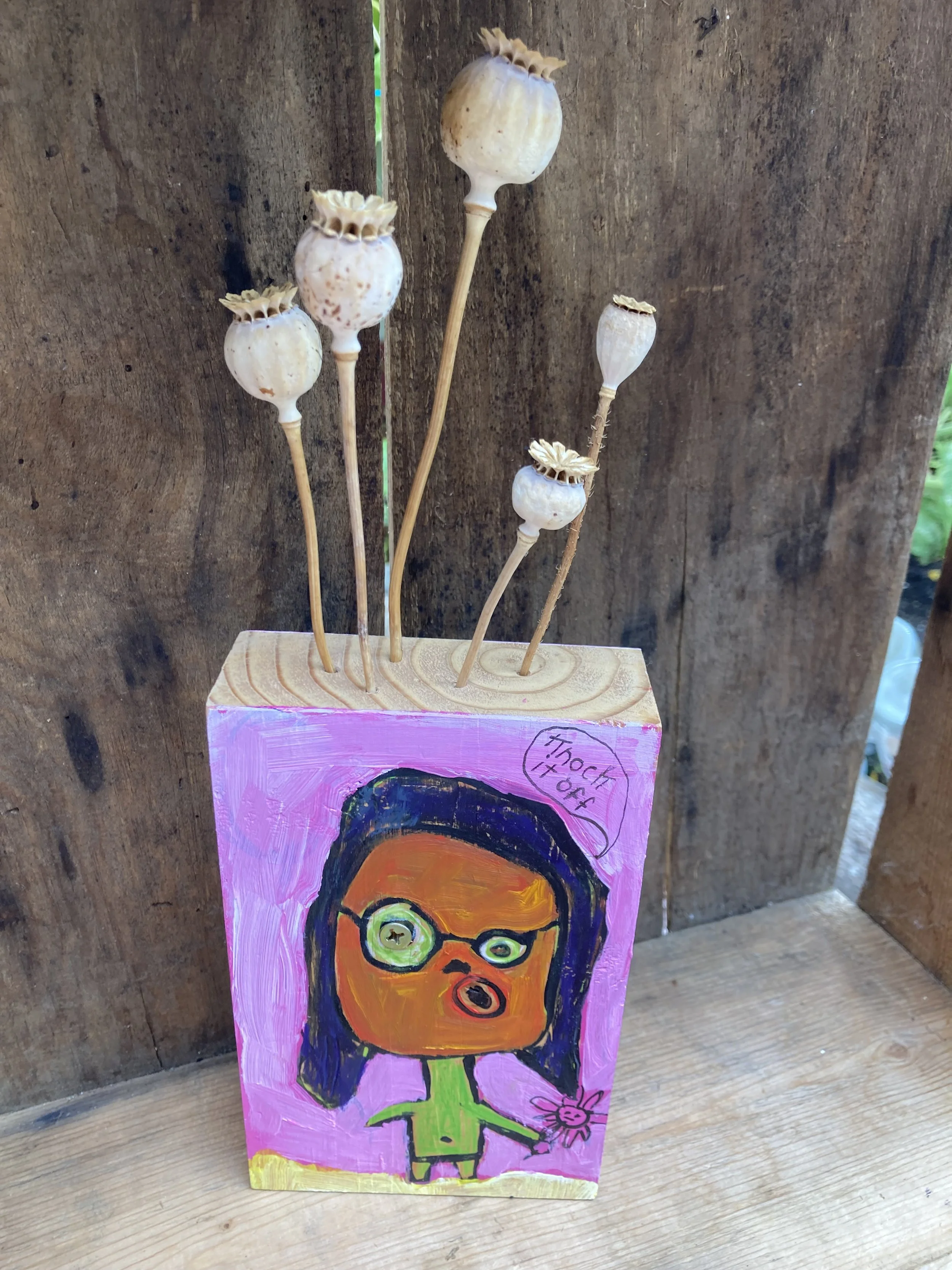 Knock It Off Mood Block/Flower Holder 3-D Art $50. Salvaged wood and poppy pods. It's a vase! It's art! It's cathartic!