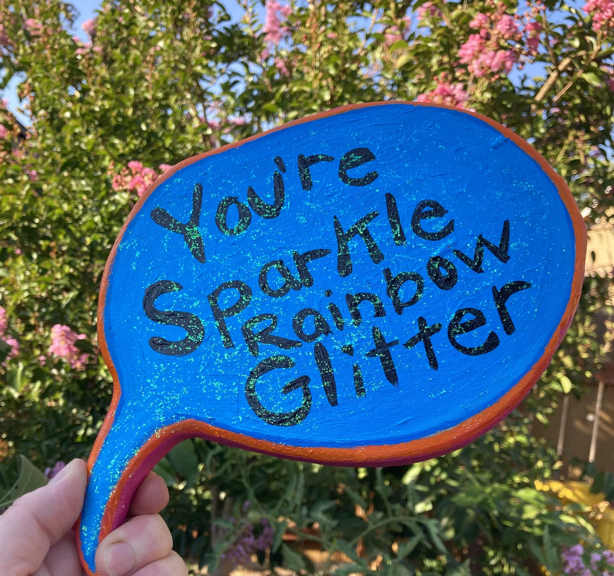 Double sided speech bubble with Spread Love $100. Also the name of a cat we had who lived 18 wonderful years.