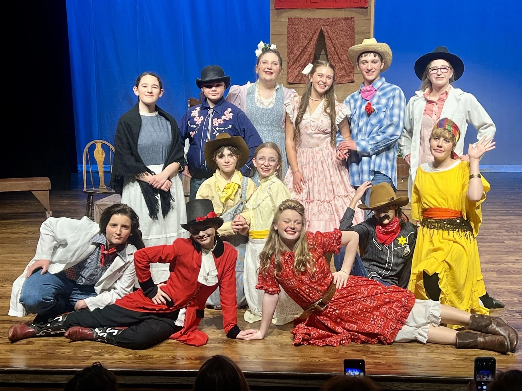 Group of students on stage after performance