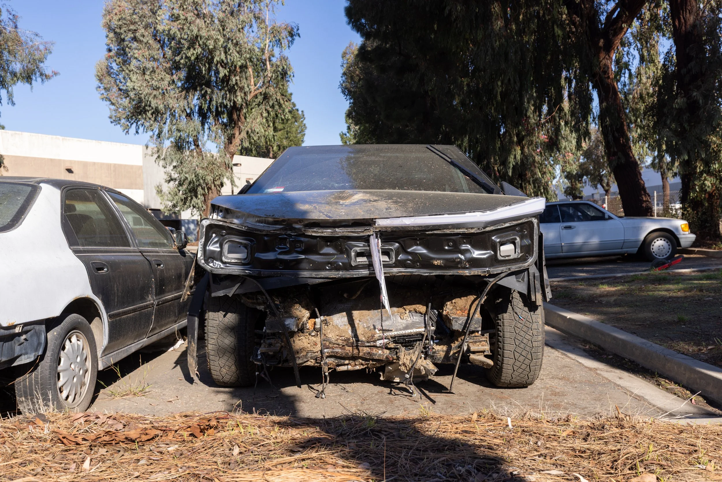 Severely damaged vehicle with major front-end collision damage that may be considered a total loss after an accident in Oxnard