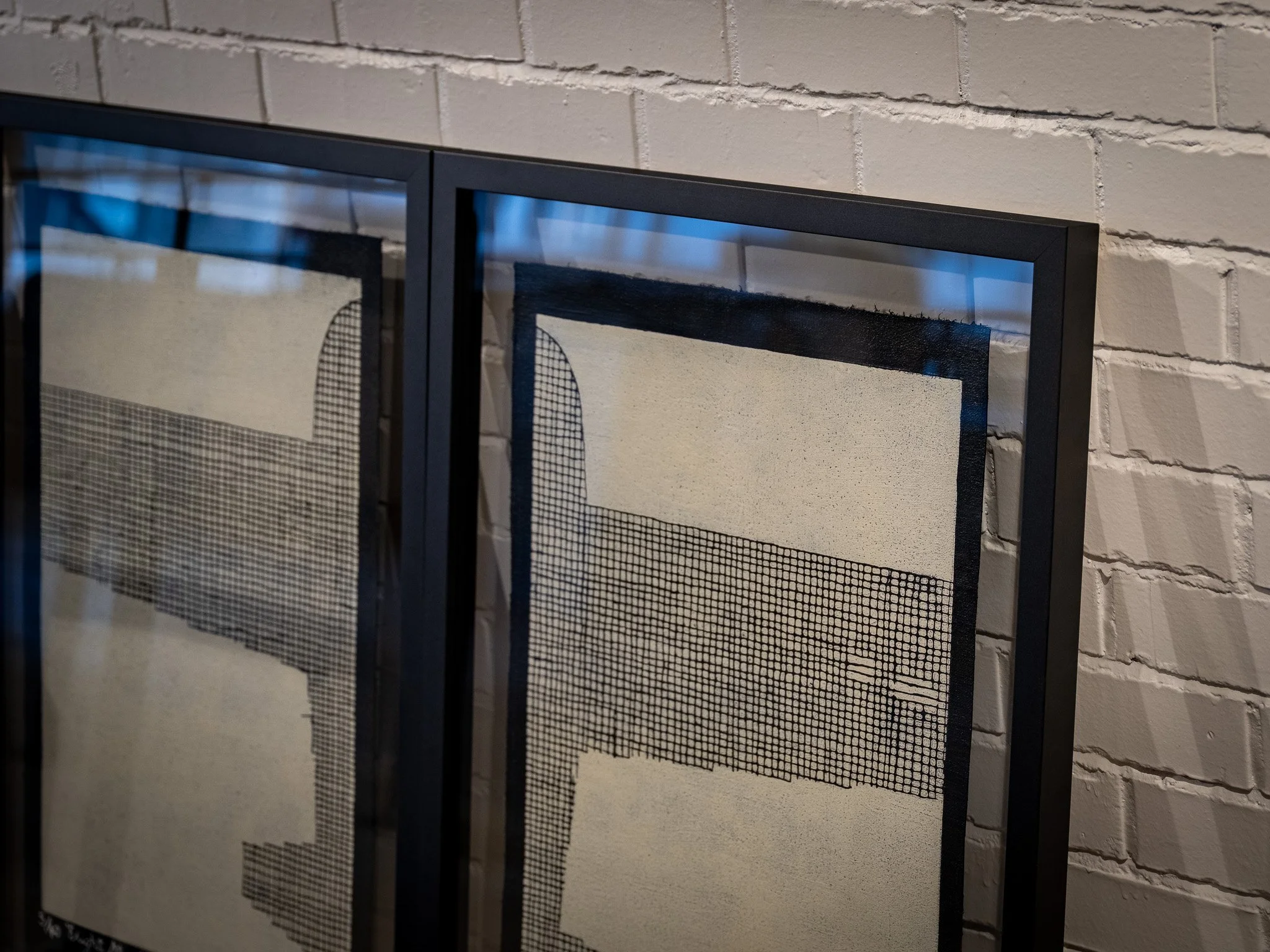 A Michelle Bryant Diptych framed in double Acrylic so the client can see their wall behind the work.