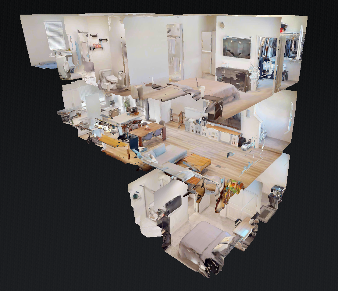 A 3D view of a multi-room home interior including living room, kitchen, bedroom, and bathroom, with furniture and decor visible in each space.