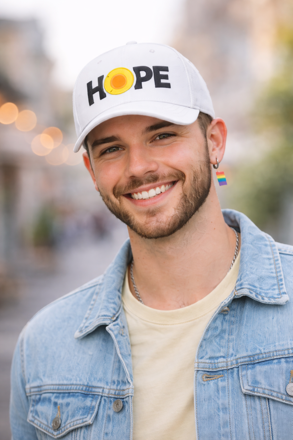 Gay man with HOPE baseball cap.png