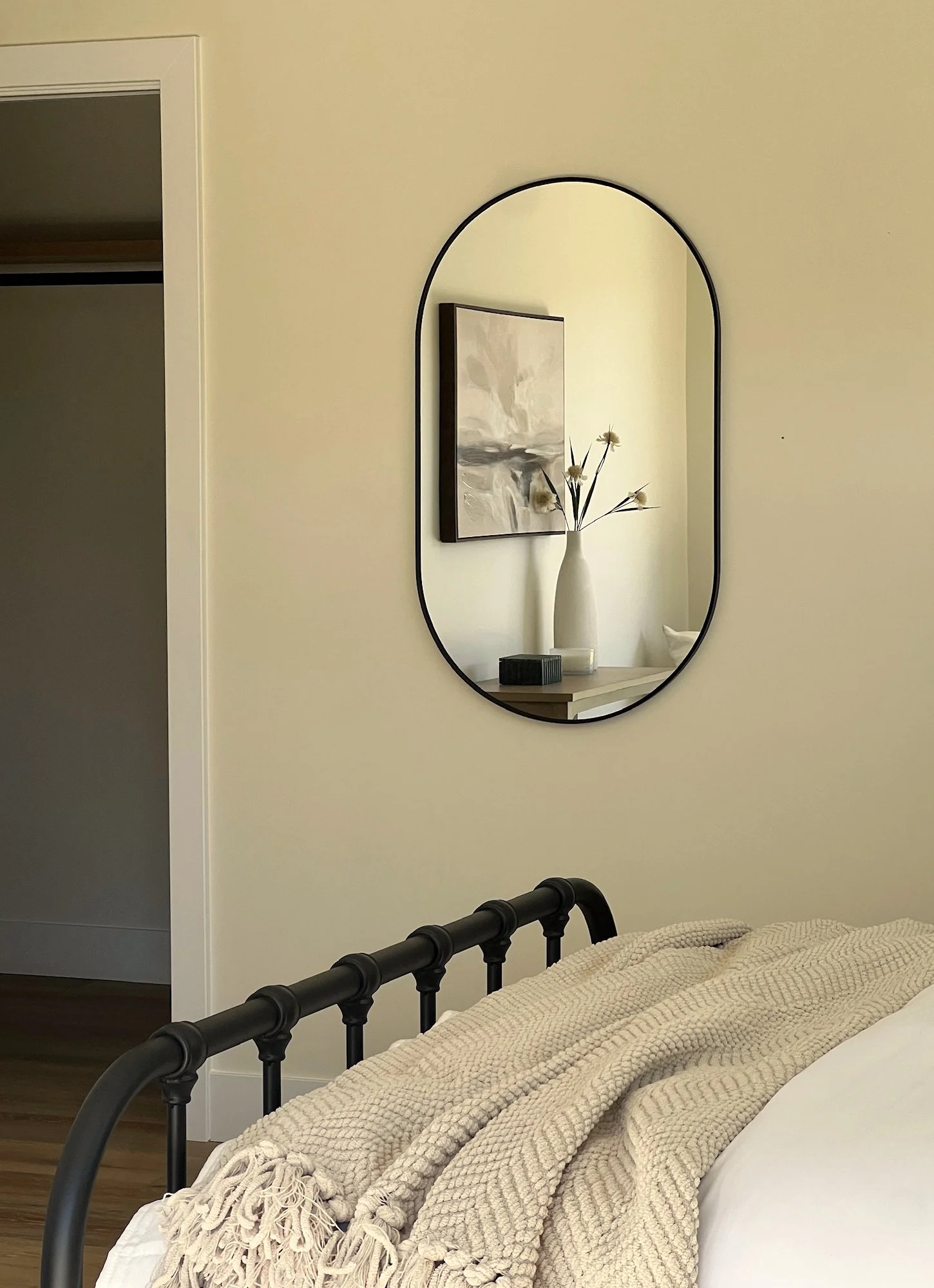 23-san-diego-bedroom-interior-oval-mirror-content-creator.jpg