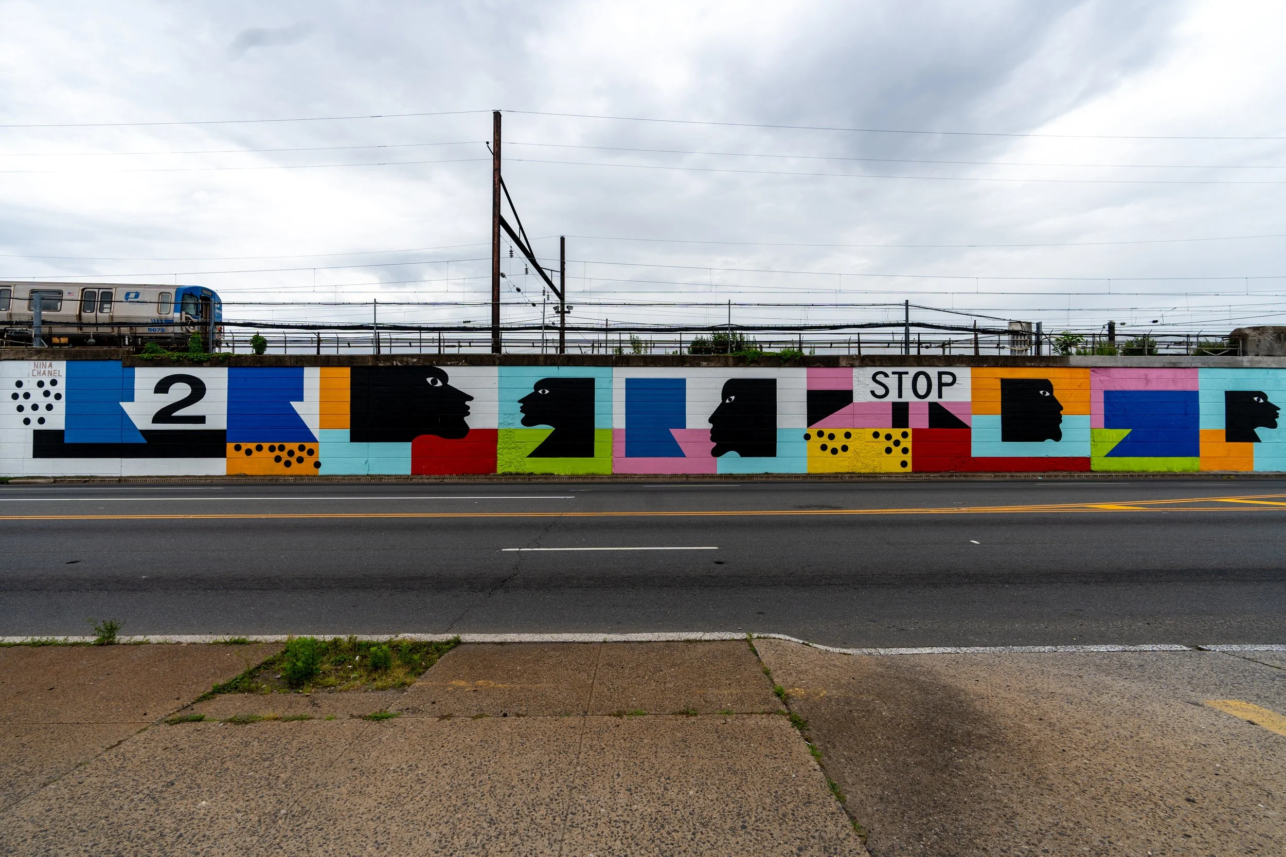 Nina Chanel Abney

Untitled (2016; restored 2024)
Gateways to Newark: Portraits

Commissioned by the City of Newark, 
Division of Arts and Cultural Affairs 
and Newark Downtown District
McCarter Highway (Route 21), Newark, NJ