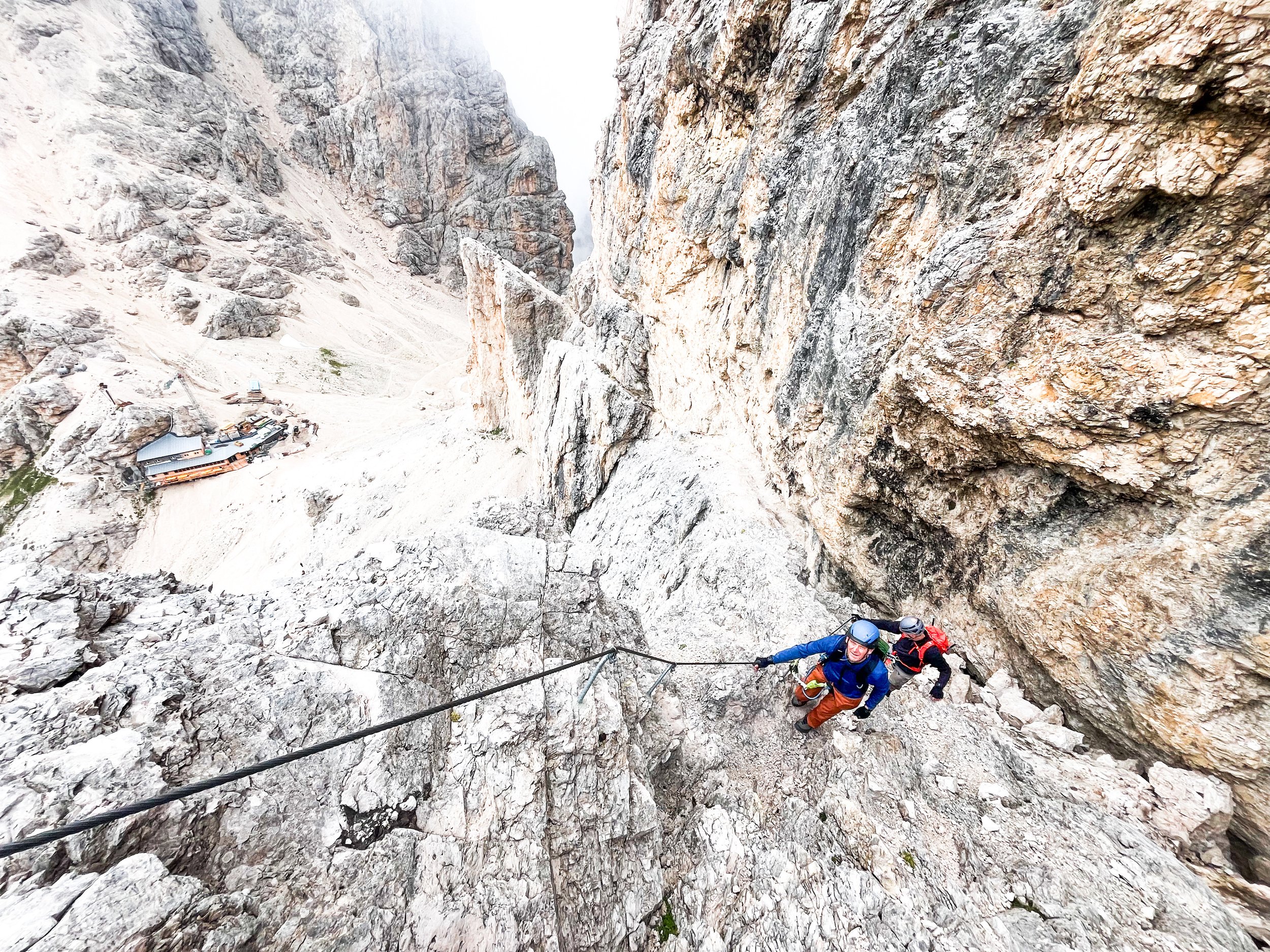 The beginning of the via ferrata Antermoia, and the Rifugio Principe in the background