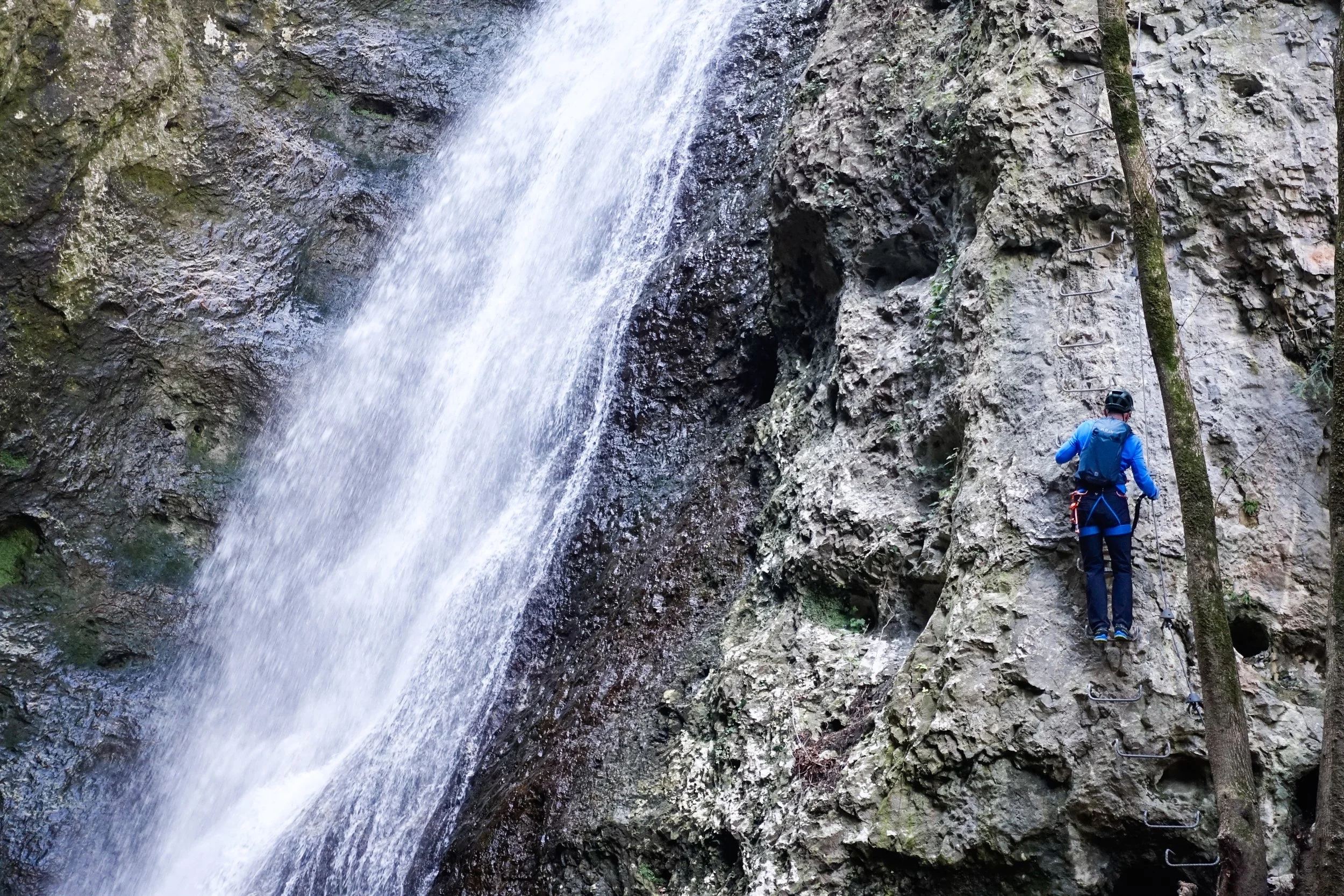 Climbing by the waterfall of Rio Fai river