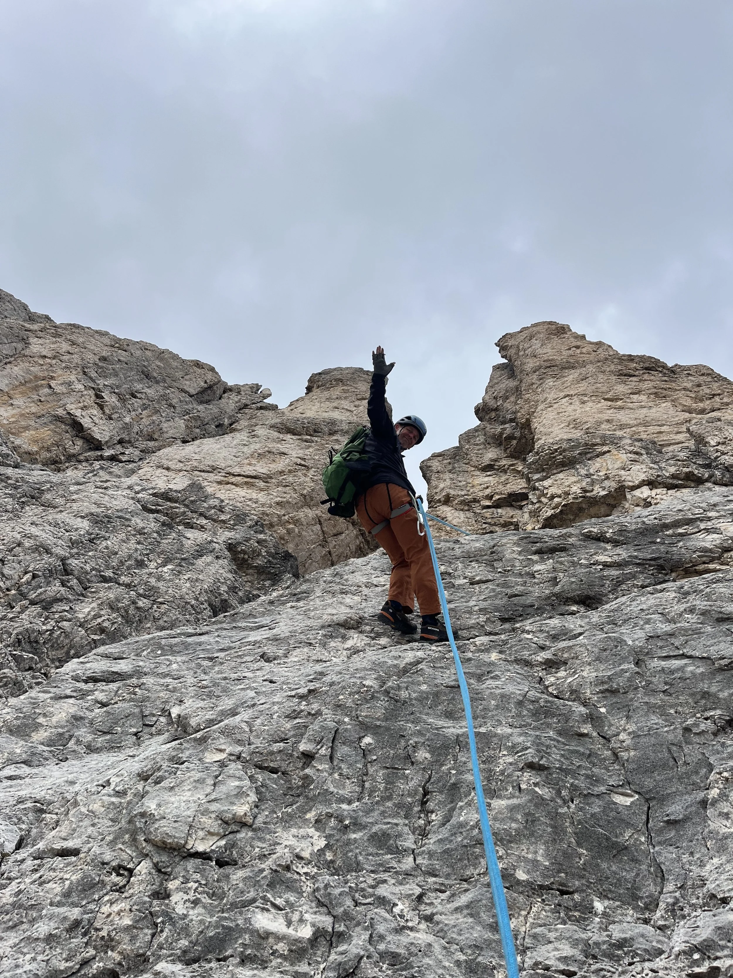 Repelling from the Stabeler tower, rosengarten dolomites, during a rock climbing safari with Dolomitesafari. Filippo Barbieri guiding. 