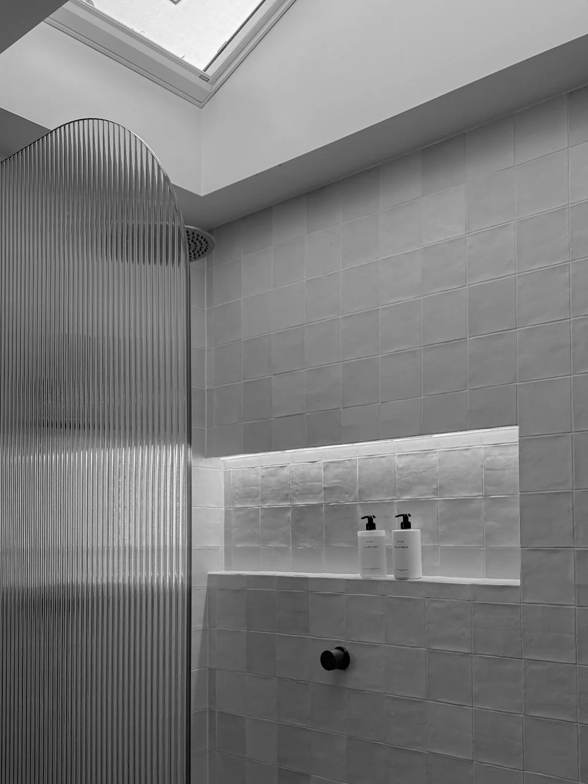 Our Main Bathroom - adorned with natural light and beautiful shadows spilling through into the shower space. With a custom large skylight from @veluxaustralia which opens up to let airflow through. The skylight is also on a sensor so any rain droplet