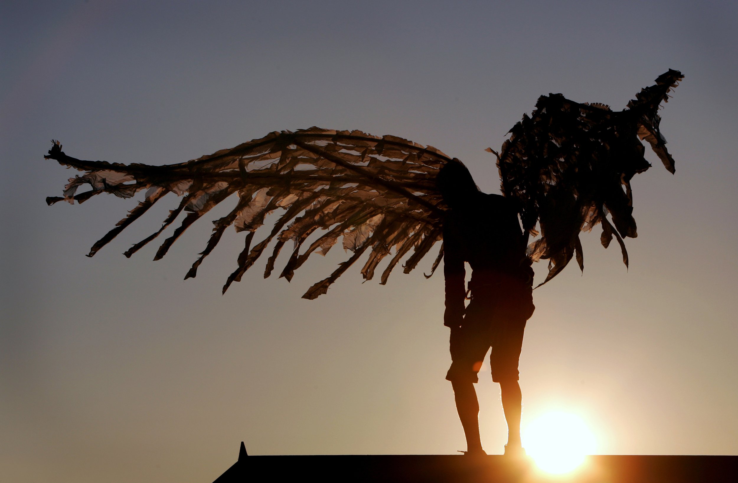 A Very Old Man With Enormous Wings