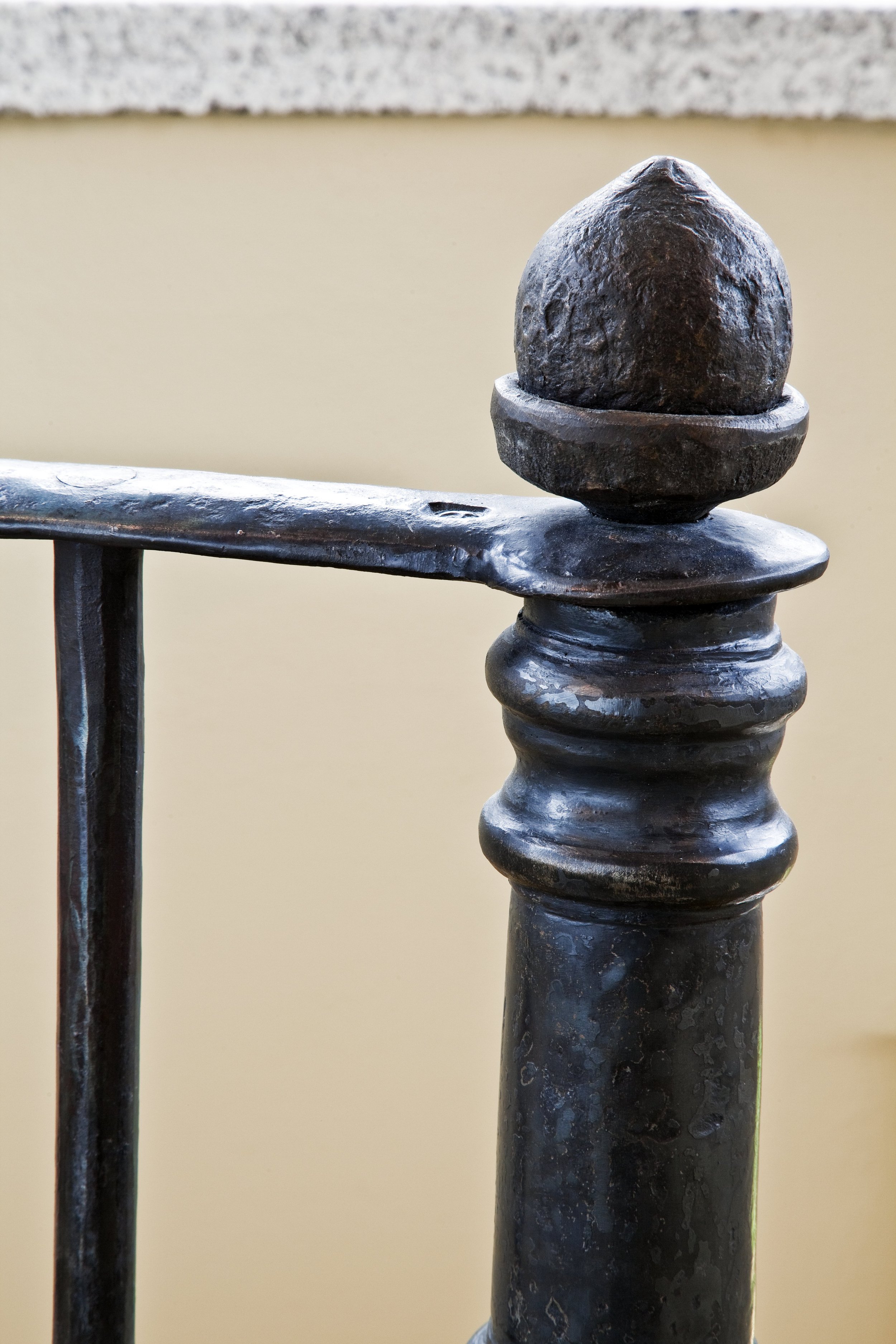 Forged tubular newel post