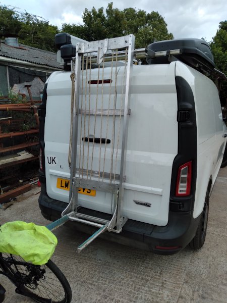 Aluminium bike rack with pulley system to raise bikes clear of rear view cameras