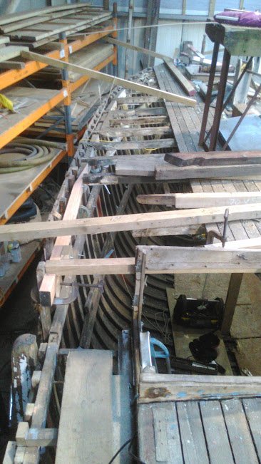 Exposing the beam ends and side decks
