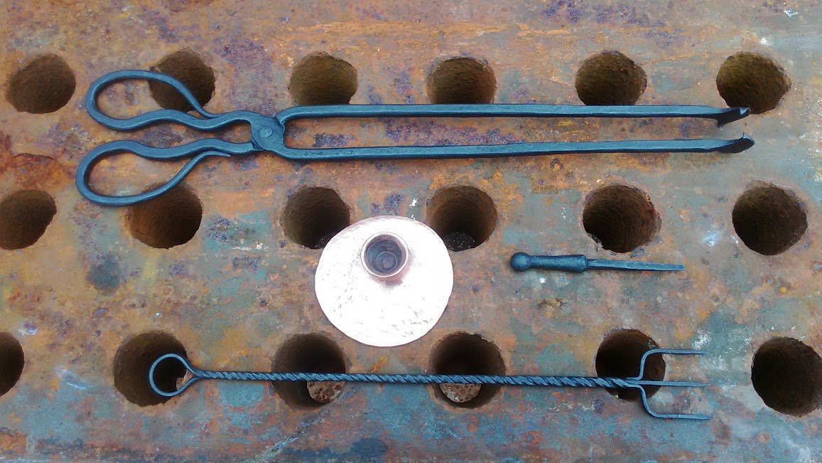 kashgar tongs, twisted toasting fork and copper forged sconce.jpg