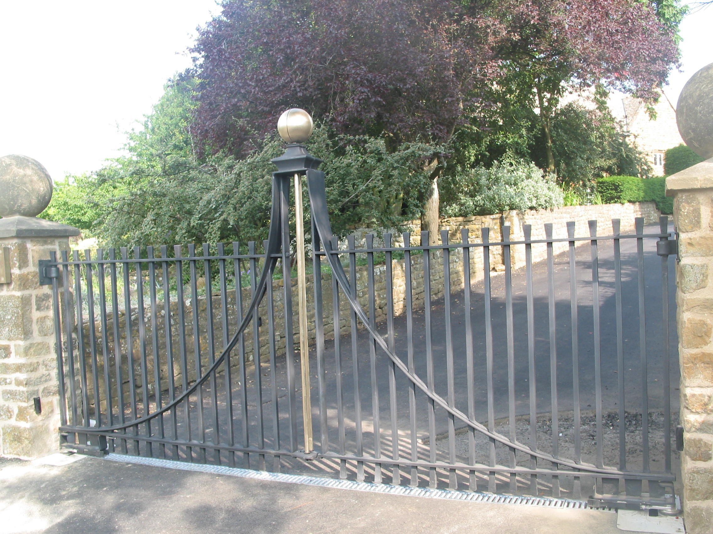 gates with bronze finial (design Simon Foot of Janine Stone, detail and executed JC)