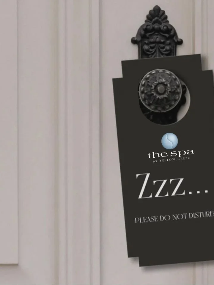 This is an image of a door knob with a do not disturb sign