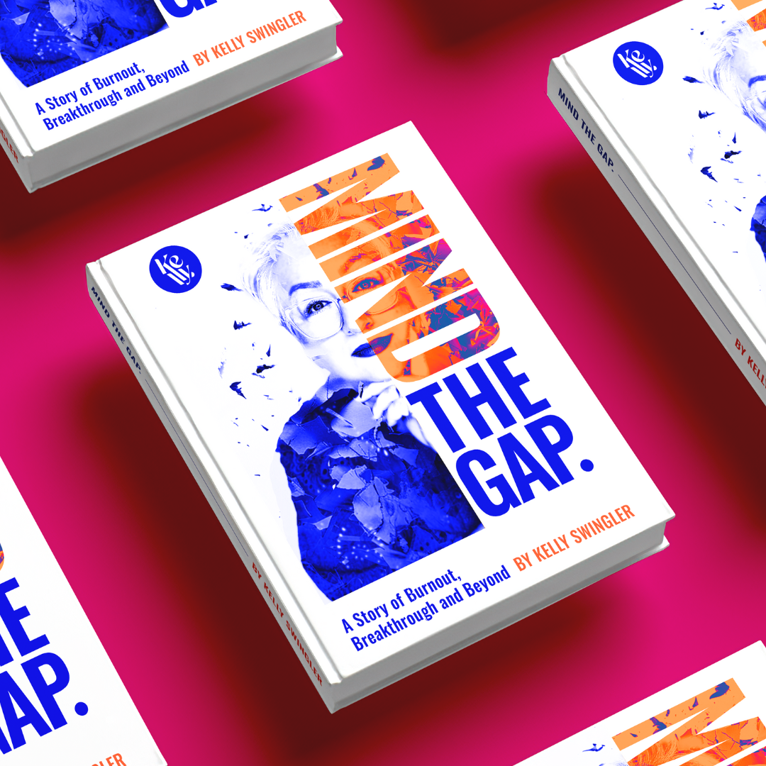Book titled "LIFT THE GAB" by Kelly Swingler with a cover featuring a woman with short blond hair, glasses, and a thoughtful expression, set against a background with a floral pattern and abstract design in blue, orange, and white. The book is on a magenta surface with multiple copies arranged in the image.