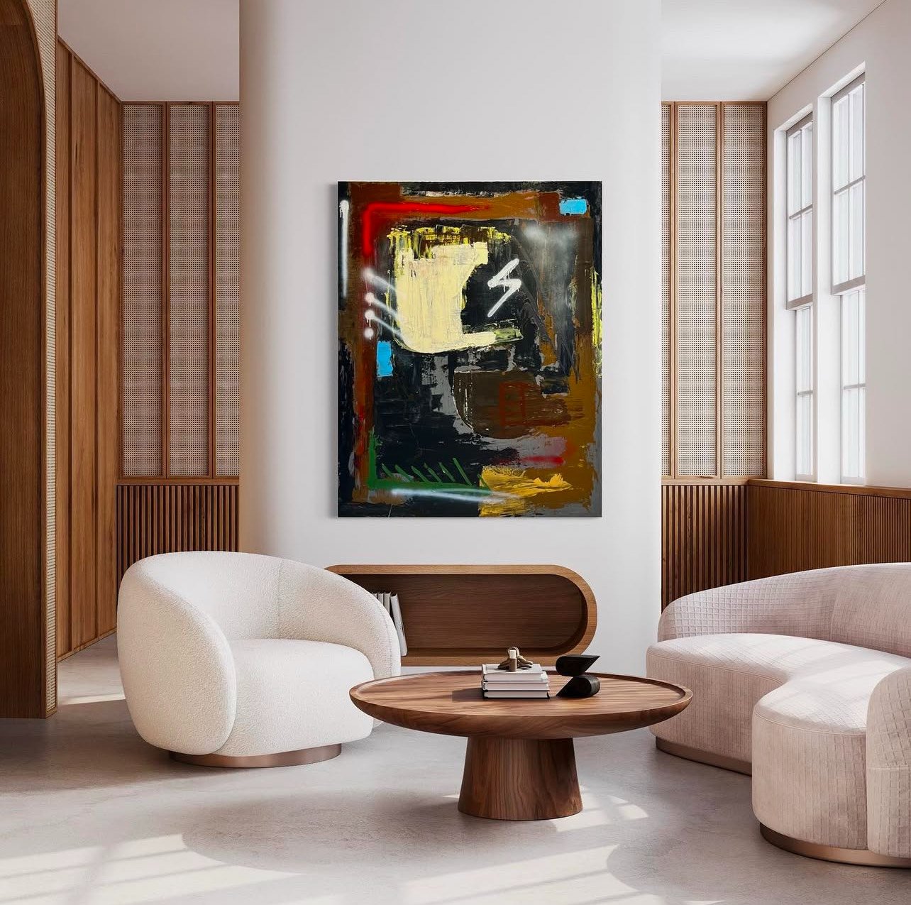 Modern living room with white and beige curved sofas, a round wooden coffee table, and a large abstract painting on the wall between tall windows with wooden paneling.