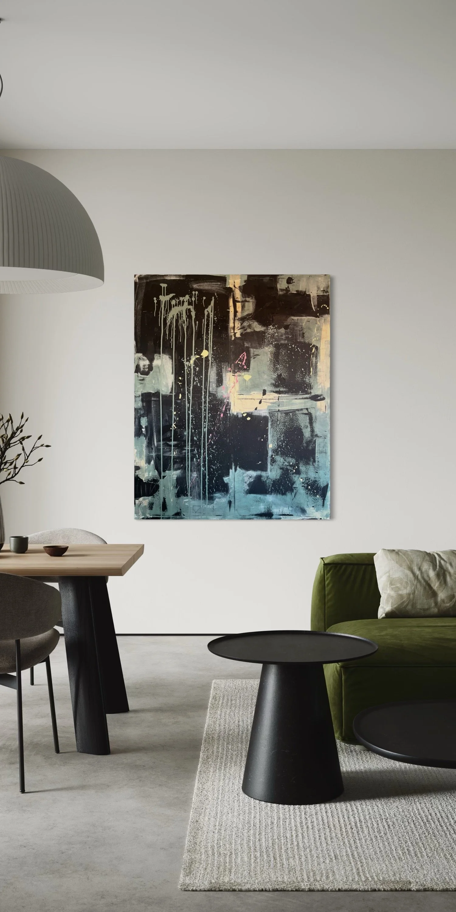 Modern living room with abstract black, blue, and white painting on white wall, green velvet sofa, black round coffee table, light-colored rug, dining table with chairs, and ceiling lamp.