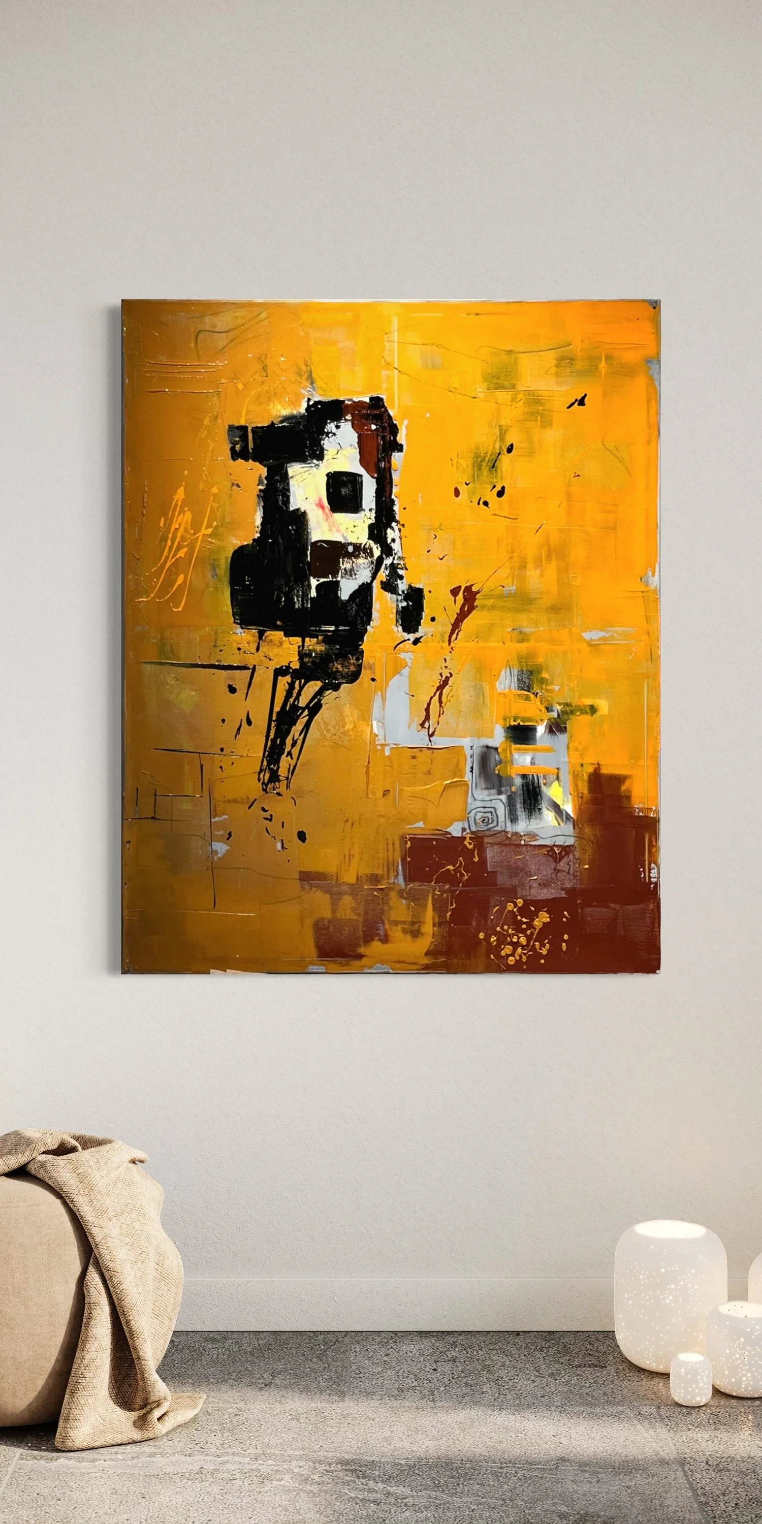 Abstract art painting with black, white, and brown monument on a yellow and orange background, hung on a white wall, with white decorative vases on the floor.