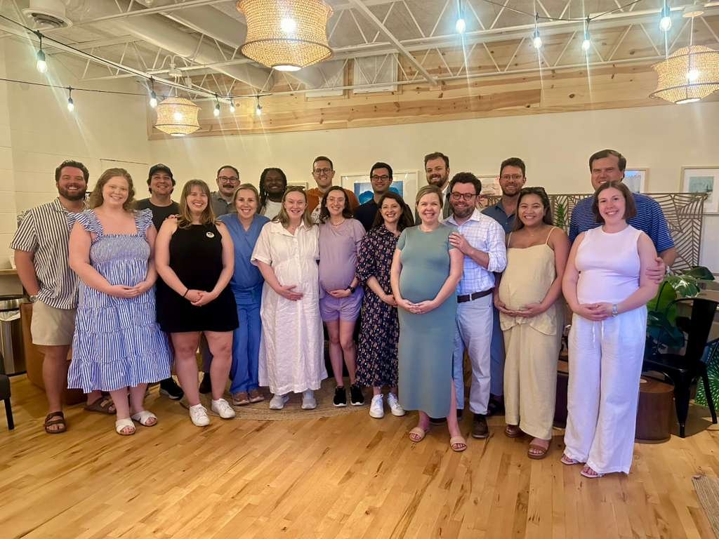 Happy group of expecting parents at the end of the Peri Prenatal Course