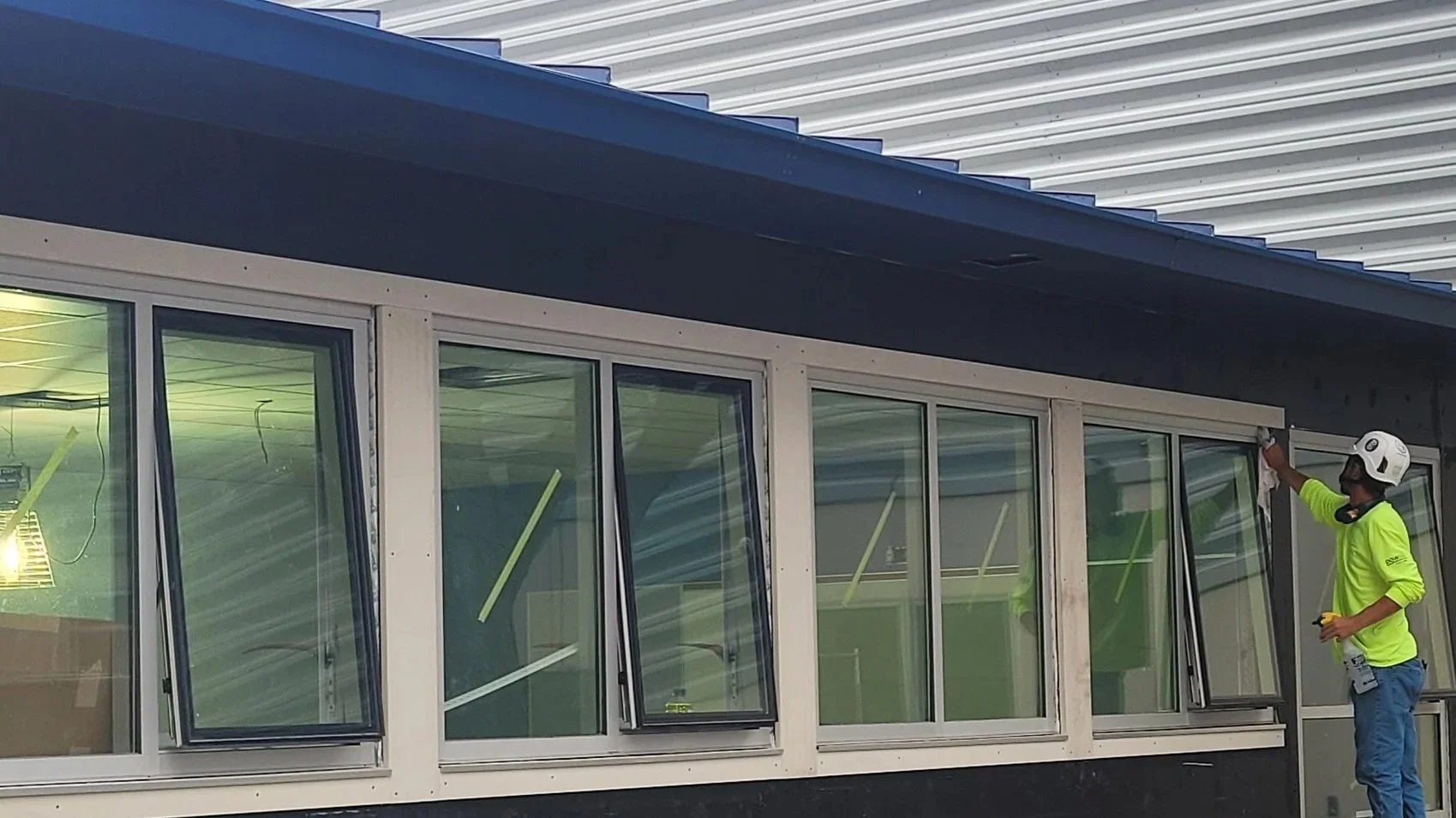 Caulking perimeter of new windows installation