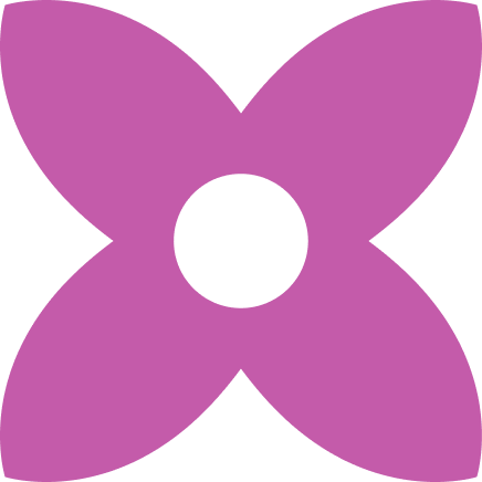 A purple geometric shape resembling a stylized flower or butterfly with four large petals and a hole in the center.