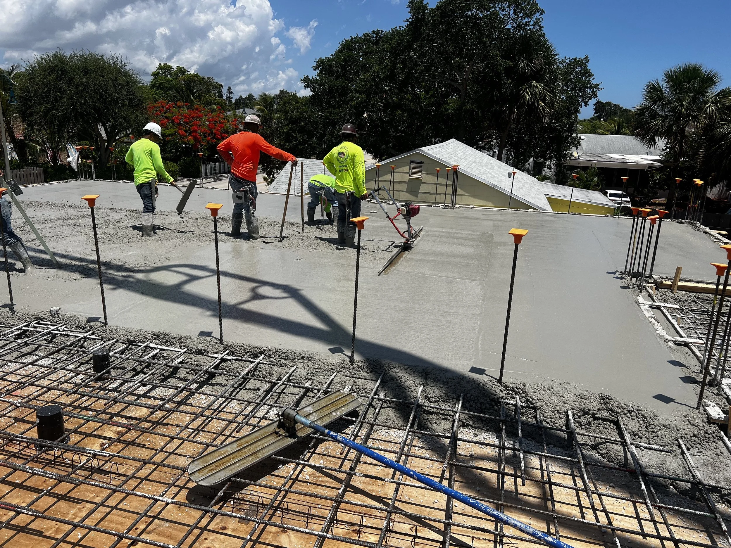 Oranssi technician working on a roof project
