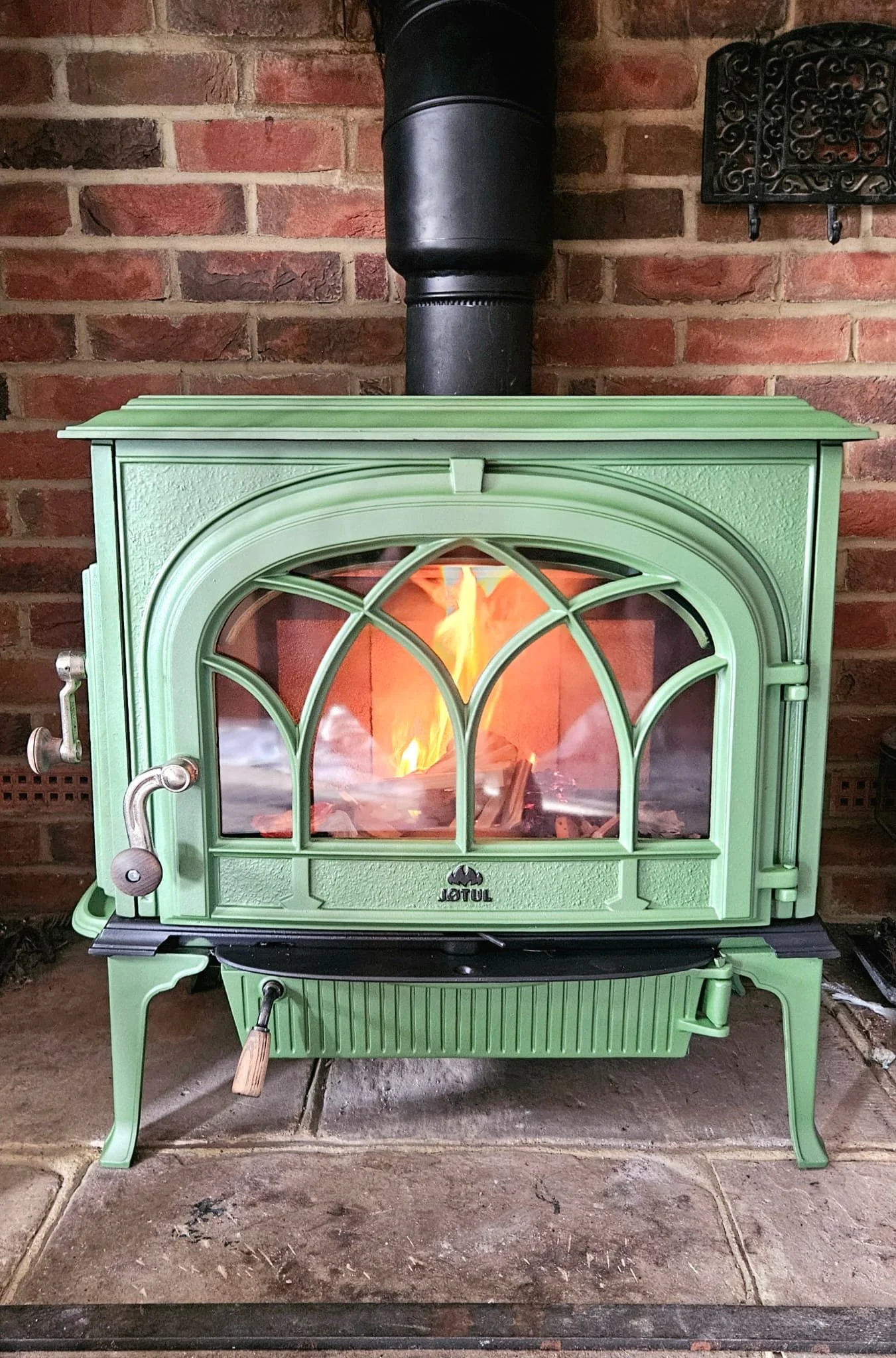 Refurbished Green Jotul log burner - before and after restoration in Dover, Kent.