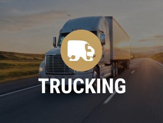 A semi-truck on a highway representing specialized bookkeeper and fuel tax reporting for trucking companies.