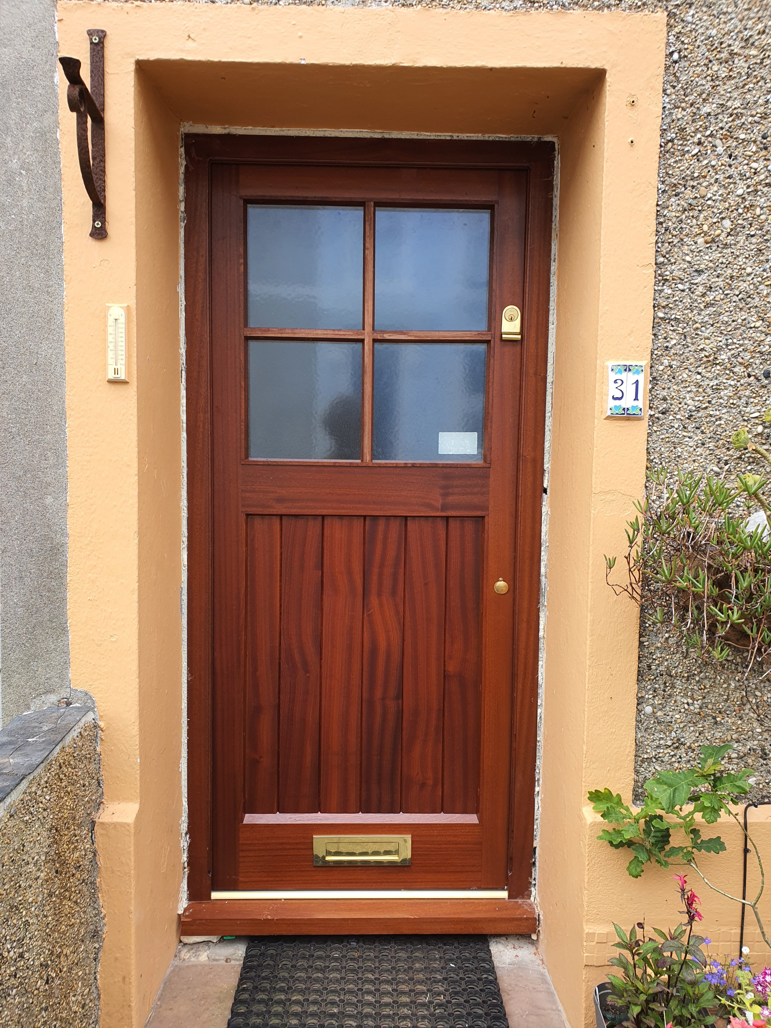 Bespoke traditional hardwood cottage door installed in Cornwall