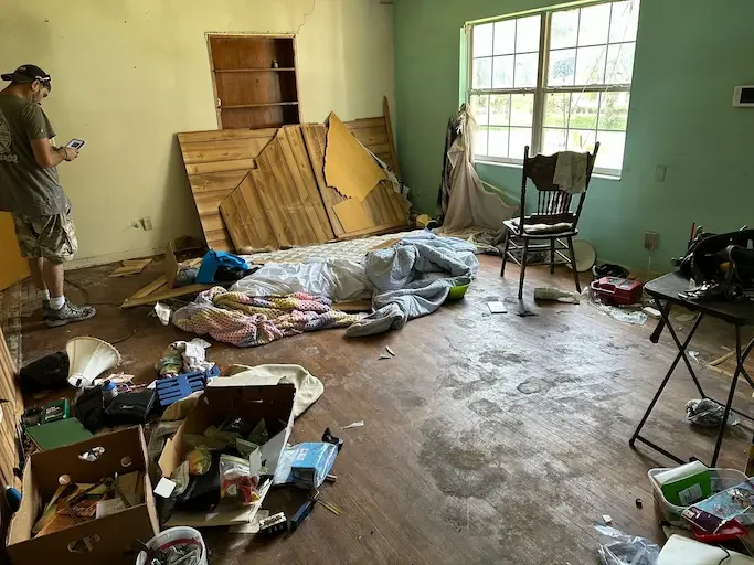 Hoarder house cleanout in Spring Hill, FL with junk and debris removed by Five Alarm Dumpsters