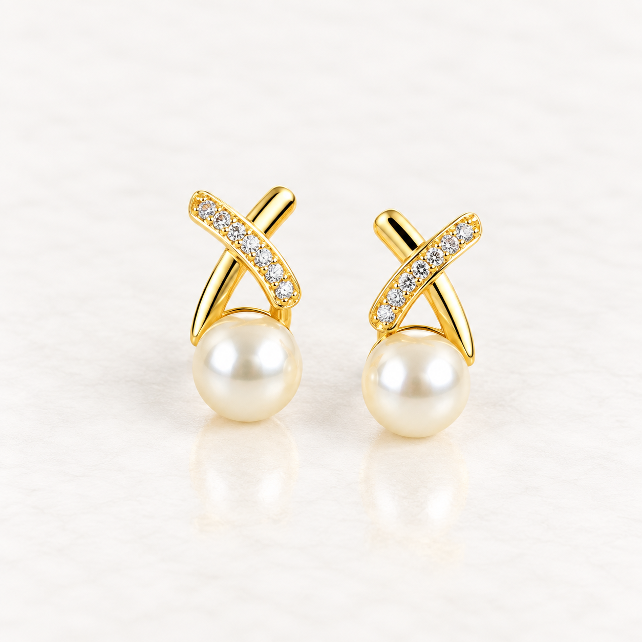 Aretes X con perla