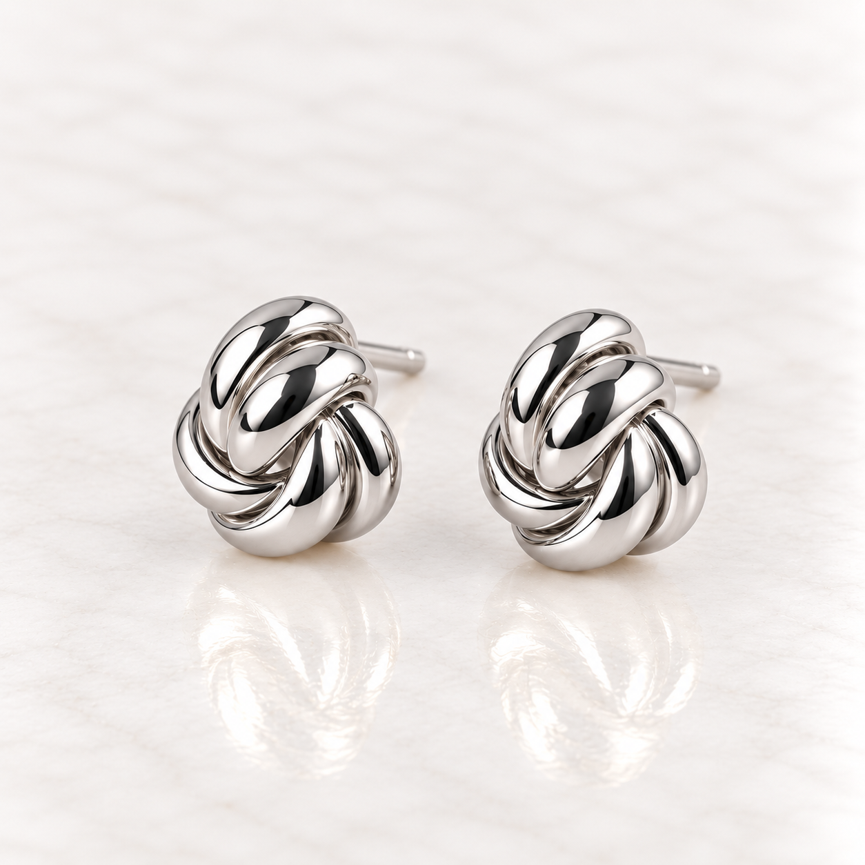 Polished Silver Knot Earrings.png