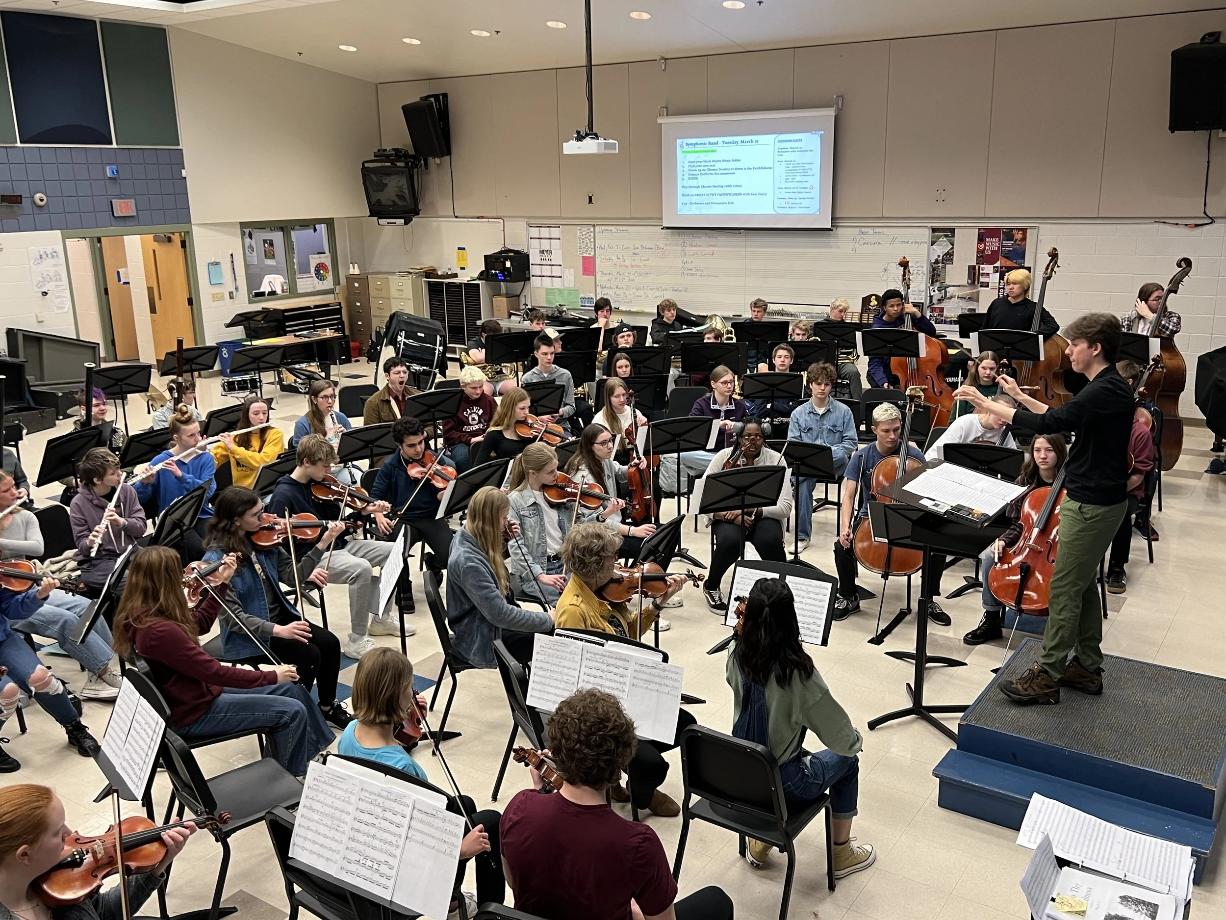 Conducting and rehearsing my arrangement of Great is Thy Faithfulness with the GRCHS Orchestra and Band, Fall 2023